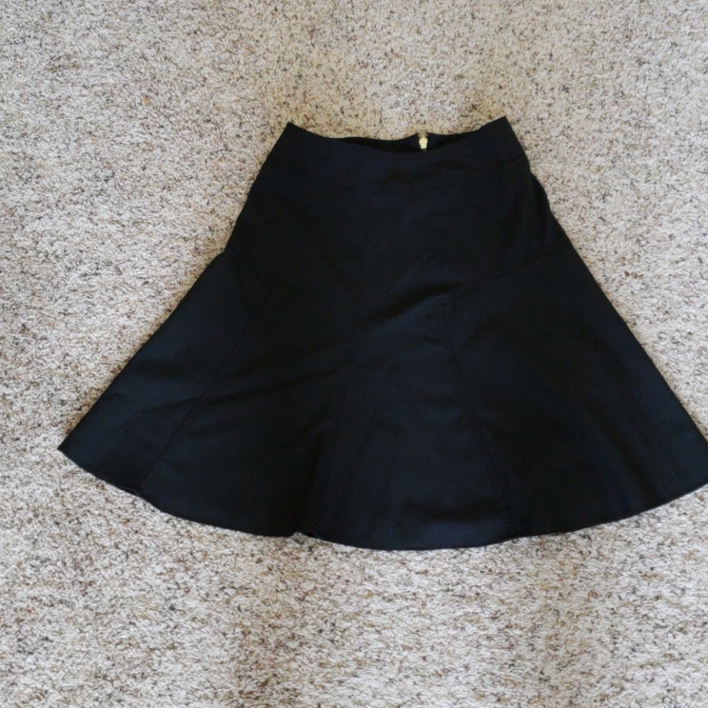 Black fitted skirt that flares at the bottom